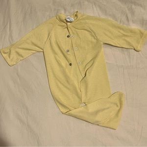Spencer’s beautiful pastel yellow small(11lb) newborn onesie